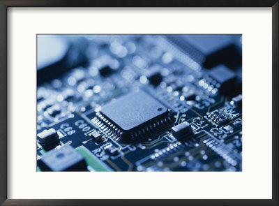 Close View Of Chip On Computer Circuit Board by Taylor S. Kennedy Pricing Limited Edition Print image