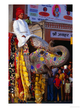 Man Riding Decorated Elephant In Street Parade Of Annual Elephant Festival, Jaipur, India by Paul Beinssen Pricing Limited Edition Print image