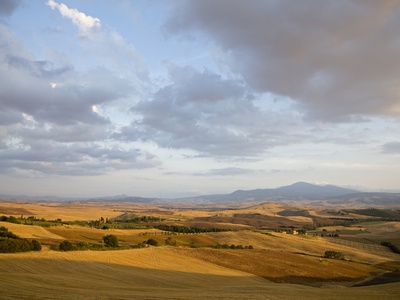 Italy, Tuscany, Harvested Fields And View Onto Monte Amiata by Fotofeeling Pricing Limited Edition Print image