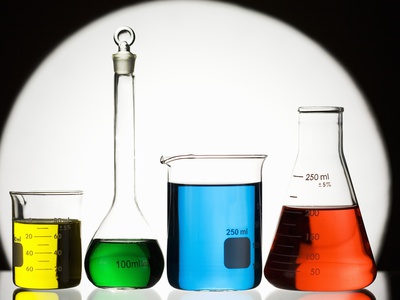 Colored Solutions In Assorted Laboratory Glassware by Sean Russell Pricing Limited Edition Print image