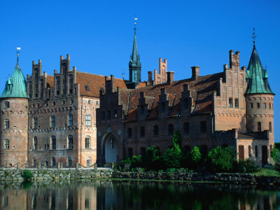 Exterior Of Egeskov Slot (Palace), Funen, Denmark by Jon Davison Pricing Limited Edition Print image