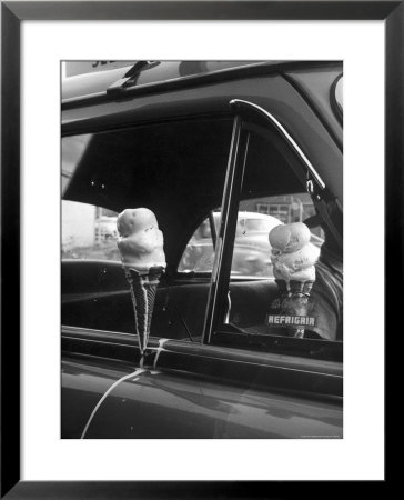 Ice Cream Cone Melting Outside Rolled Up Window Of Air Conditioned Car by John Dominis Pricing Limited Edition Print image