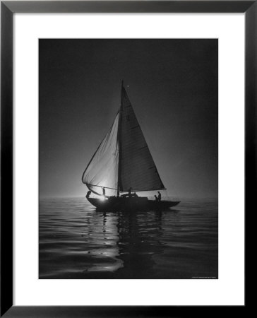 Full Sails During A Night Sailboat Race, With The Sun Peeking Over The Horizon by Cornell Capa Pricing Limited Edition Print image