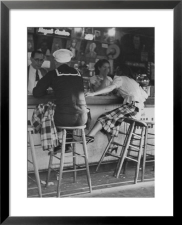 Sailor On Shore Leave Sitting At A Soda Fountain With Young Woman by Peter Stackpole Pricing Limited Edition Print image