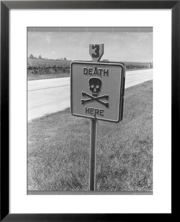 Skull And Crossbones Surrounded By The Words Death Here Marking Fatal Car Accident by Alfred Eisenstaedt Pricing Limited Edition Print image