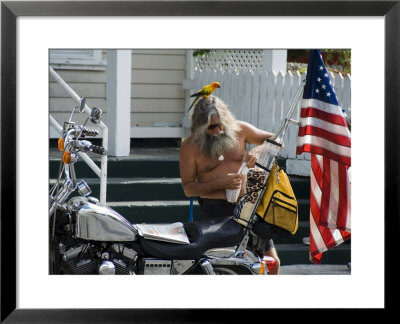 Motorcyclist With Bird On Head, Duval Street, Key West, Florida, Usa by R H Productions Pricing Limited Edition Print image