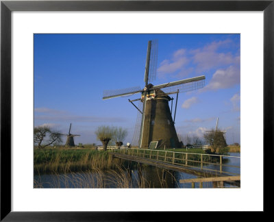 Canal And Windmills, Kinderdijk, Unesco World Heritage Site, Holland (The Netherlands), Europe by Gavin Hellier Pricing Limited Edition Print image