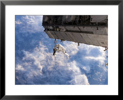 Astronaut Participates In Extravehicular Activity by Stocktrek Images Pricing Limited Edition Print image