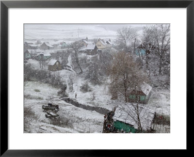 Winter Snows Begin To Fall On Village, Transylvania by Gavin Quirke Pricing Limited Edition Print image