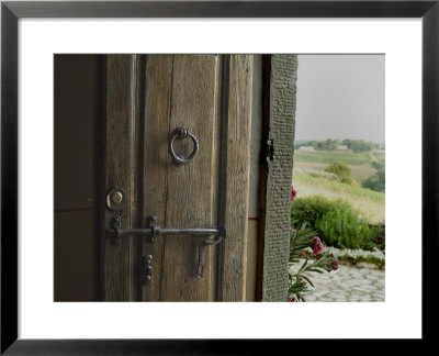 Close View Of A Wooden Door On A Villa Opening To Hills Of Tuscany, Italy by Todd Gipstein Pricing Limited Edition Print image