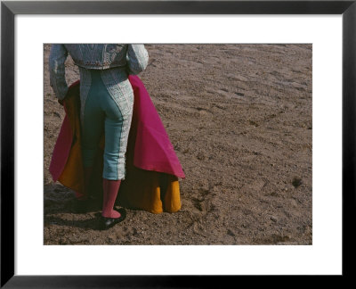 Matador In An Ornate Costume Stands With His Back To The Camera by Raul Touzon Pricing Limited Edition Print image