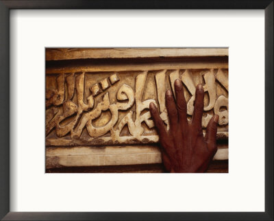 A Man Runs His Hand Over Arabic Script At The Famous Jama Masjid by Eightfish Pricing Limited Edition Print image