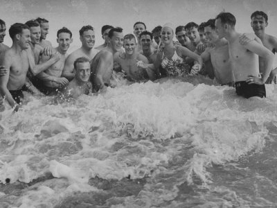 Dorothy Lamour Swimming With Members Of Battery A At Party by William C. Shrout Pricing Limited Edition Print image