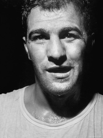 Heavyweight Boxer Rocky Marciano Dripping With Sweat After Workout In Training Camp At Grossinger's by Al Fenn Pricing Limited Edition Print image