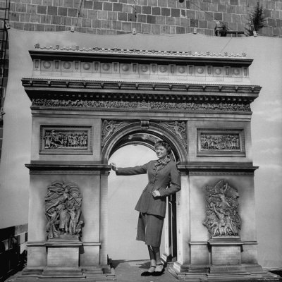 Actress Ingrid Bergman Posing With Arc De Triomphe Replica by Allan Grant Pricing Limited Edition Print image