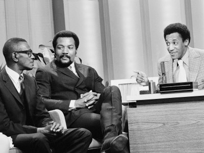 Comedian Bill Cosby As Guest Host On The Tonight Show, Interviewing Satchel Paige And Jim Brown by Henry Groskinsky Pricing Limited Edition Print image