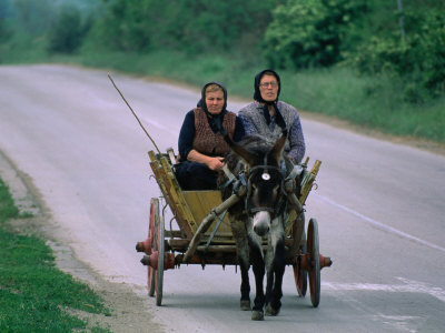 Women Travelling On Donkey And Cart, Veliko Tarnovo, Bulgaria by Chris Mellor Pricing Limited Edition Print image
