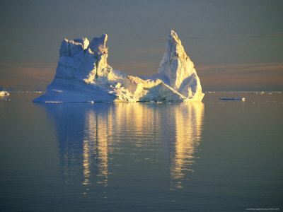 Iceberg Illuminated By The Late Evening Sun, Murchison Sound, Greenland by Nicholas Reuss Pricing Limited Edition Print image