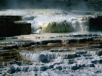 Mammoth Hot Springs At Montana Highway Entrance To Park, Yellowstone National Park, Usa by Chris Mellor Pricing Limited Edition Print image