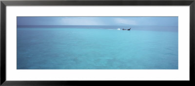 Longtail Boat Floating On Water, Bamboo Island, Thailand by Panoramic Images Pricing Limited Edition Print image