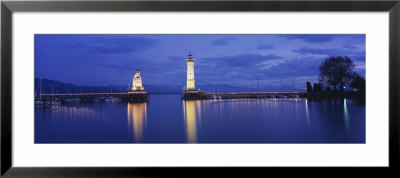 Reflection Of Lighthouse In The Lake Constance, Lindau, Germany by Panoramic Images Pricing Limited Edition Print image