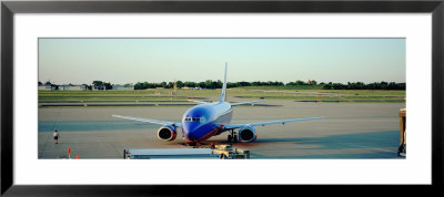 Airplane At The Airport, Midway Airport, Chicago, Illinois, Usa by Panoramic Images Pricing Limited Edition Print image