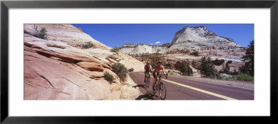 Two People Cycling On The Road, Zion National Park, Utah, Usa by Panoramic Images Pricing Limited Edition Print image