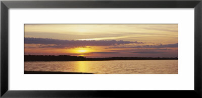 Clouds Over A Lake At Sunset, Myakka Lake, Myakka River State Park, Sarasota, Florida, Usa by Panoramic Images Pricing Limited Edition Print image