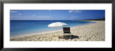 Single Beach Chair And Umbrella On Sand, Saint Martin, French West Indies by Panoramic Images Pricing Limited Edition Print image