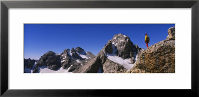 Low Angle View Of A Person Standing On A Rock, Grand Teton National Park, Wyoming, Usa by Panoramic Images Pricing Limited Edition Print image