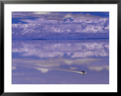 Bus Driving Through The Ethereal Landscape Of The Salar De Uyuni, Salar De Uyuni Salt Lake, Bolivia by Marco Simoni Pricing Limited Edition Print image