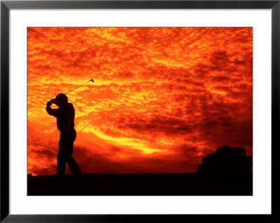Golfer And Sunset With Dramatic Clouds by Bill Bachmann Pricing Limited Edition Print image