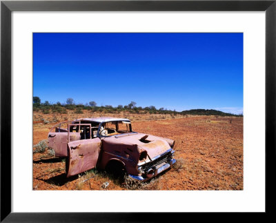 Abandoned Old Holden Car On Mereenie Loop Road, Australia by Christopher Groenhout Pricing Limited Edition Print image