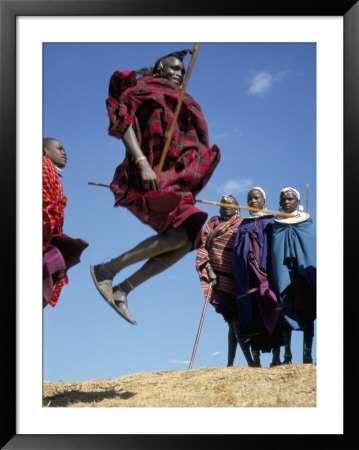 Masai Warriors Perform Jumping Dance, Masai Mara National Park, Kenya, East Africa, Africa by D H Webster Pricing Limited Edition Print image