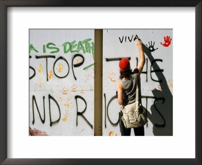 Protester Writing Anti-Uranium Mining Graffiti, Melbourne, Australia by Regis Martin Pricing Limited Edition Print image