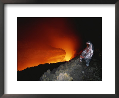 Scientist In Full Helmet And Thermal Suit Collects Lava Samples by Peter Carsten Pricing Limited Edition Print image