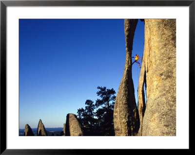A Climber Leads A Route At The Needles In South Dakota by Bill Hatcher Pricing Limited Edition Print image