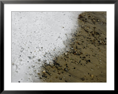 Thin Layer Of Snow Covering Pebbles And Sand On A Beach by Todd Gipstein Pricing Limited Edition Print image