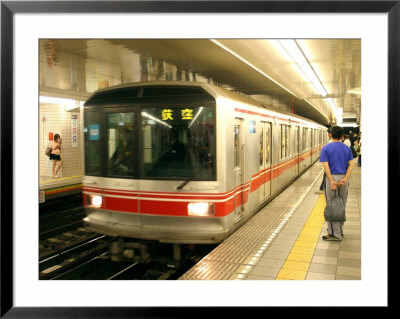People Waiting To Board Subway Train, Tokyo, Japan by Greg Elms Pricing Limited Edition Print image
