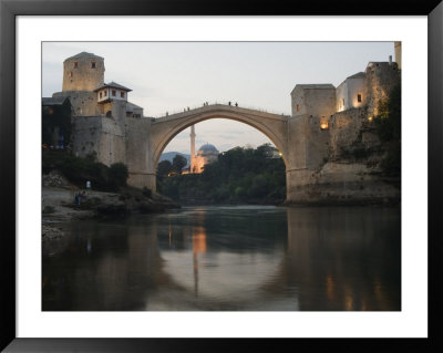 Stari Most Peace Bridge And Reflection Of Mosque On Neretva River, Bosnia, Bosnia-Herzegovina by Christian Kober Pricing Limited Edition Print image