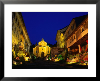 Medieval Town Of Orta San Guilio And Its Yellow Church, Milan, Italy by Stephen Saks Pricing Limited Edition Print image