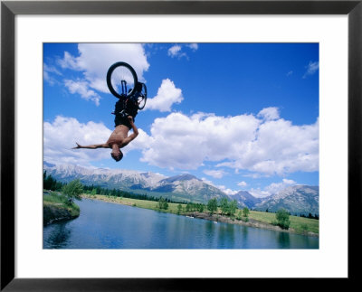 Man Leaping On A Bicycle For The Big Air Contest, Banff, Canada by Philip Smith Pricing Limited Edition Print image