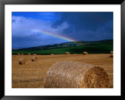 Straw Bales And Rainbow At Harvest Time, Ireland by Gareth Mccormack Pricing Limited Edition Print image