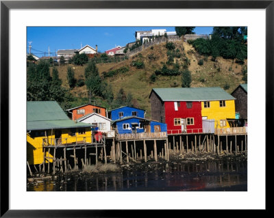 Traditional Palafitos (Fishermen's Houses On Stilts), Castro, Chile by Wayne Walton Pricing Limited Edition Print image