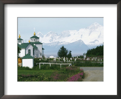 Iiamna Volcano Looms Above A Russian Orthodox Church by Rich Reid Pricing Limited Edition Print image