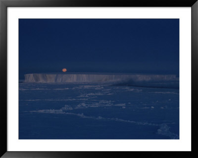 The Moon Rises Over An Iceberg In The Bellingshausen Sea by Maria Stenzel Pricing Limited Edition Print image