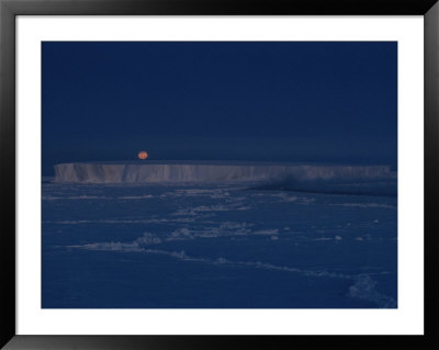The Moon Rises Over An Iceberg In The Bellingshausen Sea by Maria Stenzel Pricing Limited Edition Print image