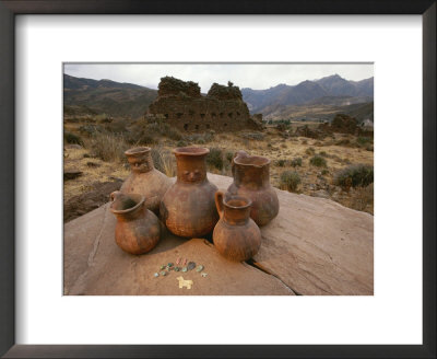 Wari Indian Vessels And Beads With Wari Ruins In The Background by Kenneth Garrett Pricing Limited Edition Print image