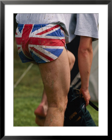 An English Athlete Shows Off His Patriotic Underwear by Annie Griffiths Belt Pricing Limited Edition Print image