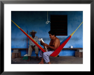 Locals Resting On The Porch In Chichicapa, Tabasco, Mexico by Jeffrey Becom Pricing Limited Edition Print image